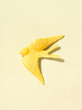Hirondelle murale en céramique émail jaune Céladon, vue de face