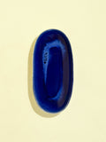Petit plat de service ovale en céramique émail bleu odyssée Céladon, vue de dessus